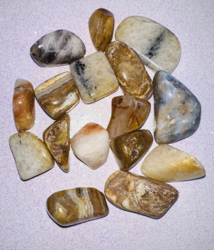 16 Multi‑Colored Tumbled Quartz Nuggets in brown, blue, and white shades